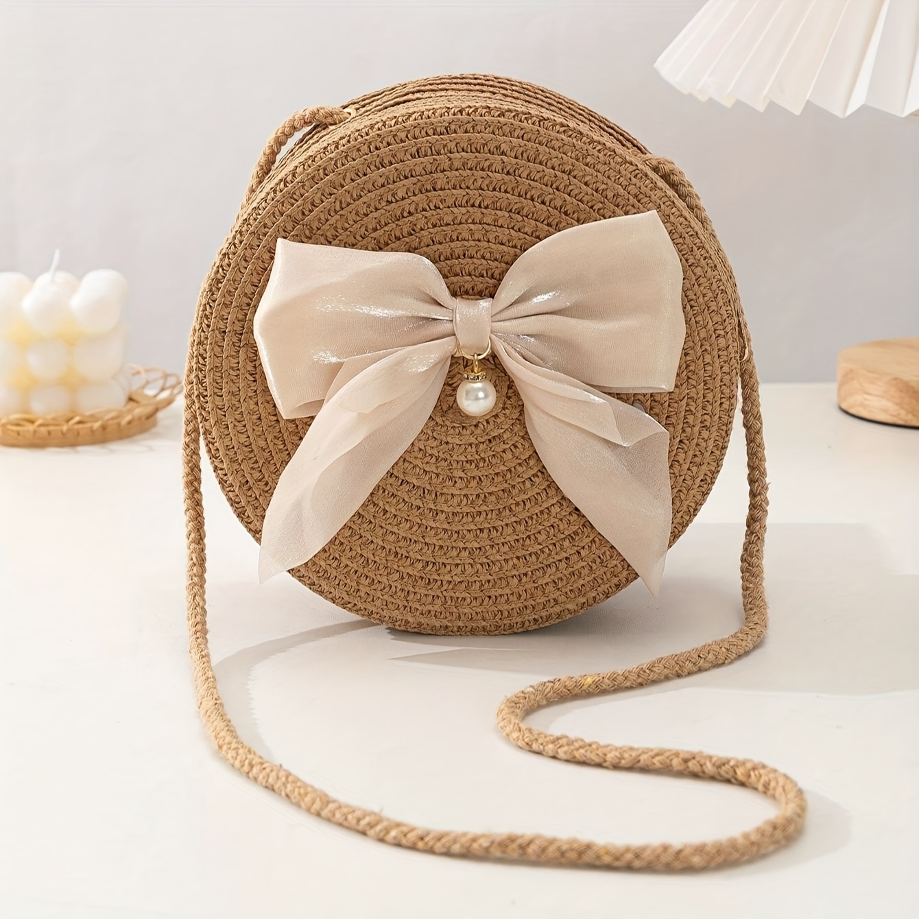 Interior Design Style - Bolsa crossbody de palha redonda elegante